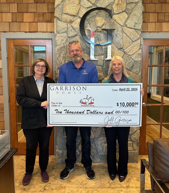 Garrison Homes donates 10,000 to therapeutic riding center Cape Gazette
